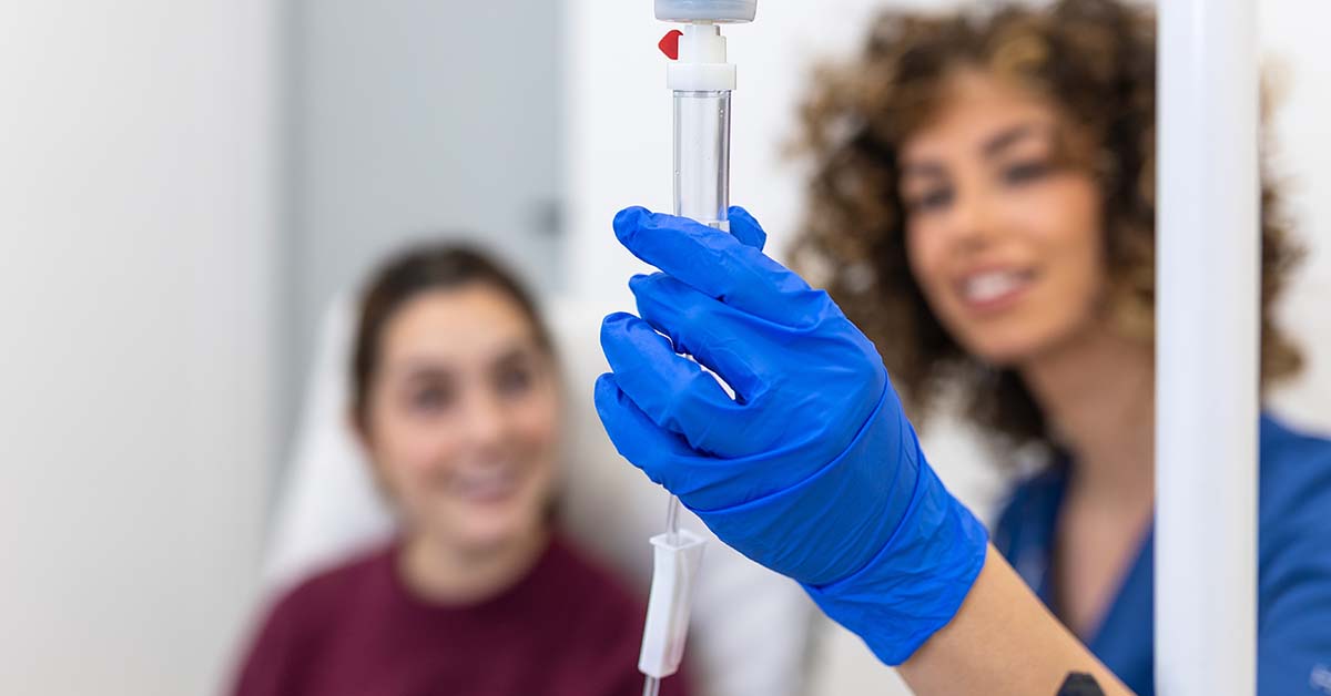 An allied health professional interacting with a patient